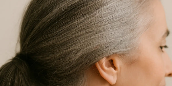 Keyoma illustration of a woman with gray, aging hair