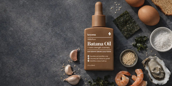 Flatlay of Keyoma Batana Oil surrounded by oysters, shrimp, garlic, and seaweed for thyroid support.