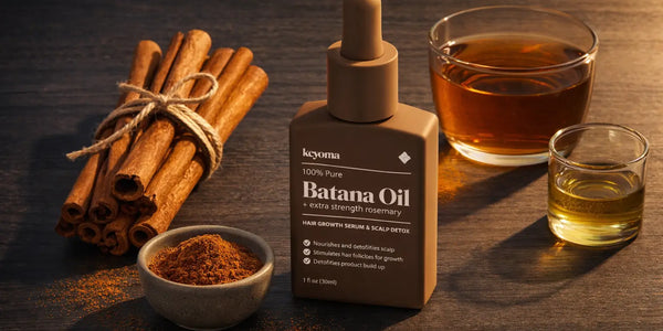 Keyoma batana oil bottle styled with cinnamon sticks and powder for hair care.