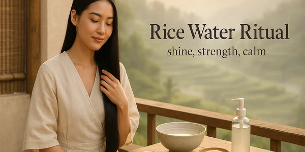 A woman calmly performs a rice water hair ritual on a terrace with a bowl, comb, and pump bottle, illustrating shine, strength, and calm in a Keyoma guide.