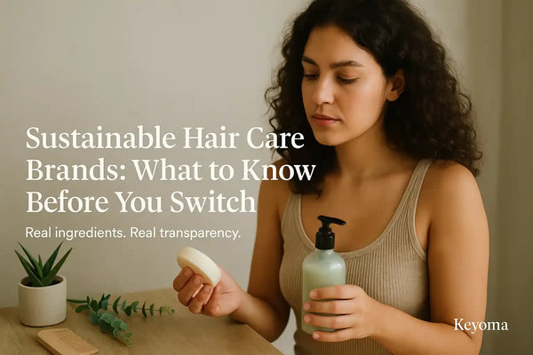 Keyoma sustainable hair care banner with woman holding clean beauty products